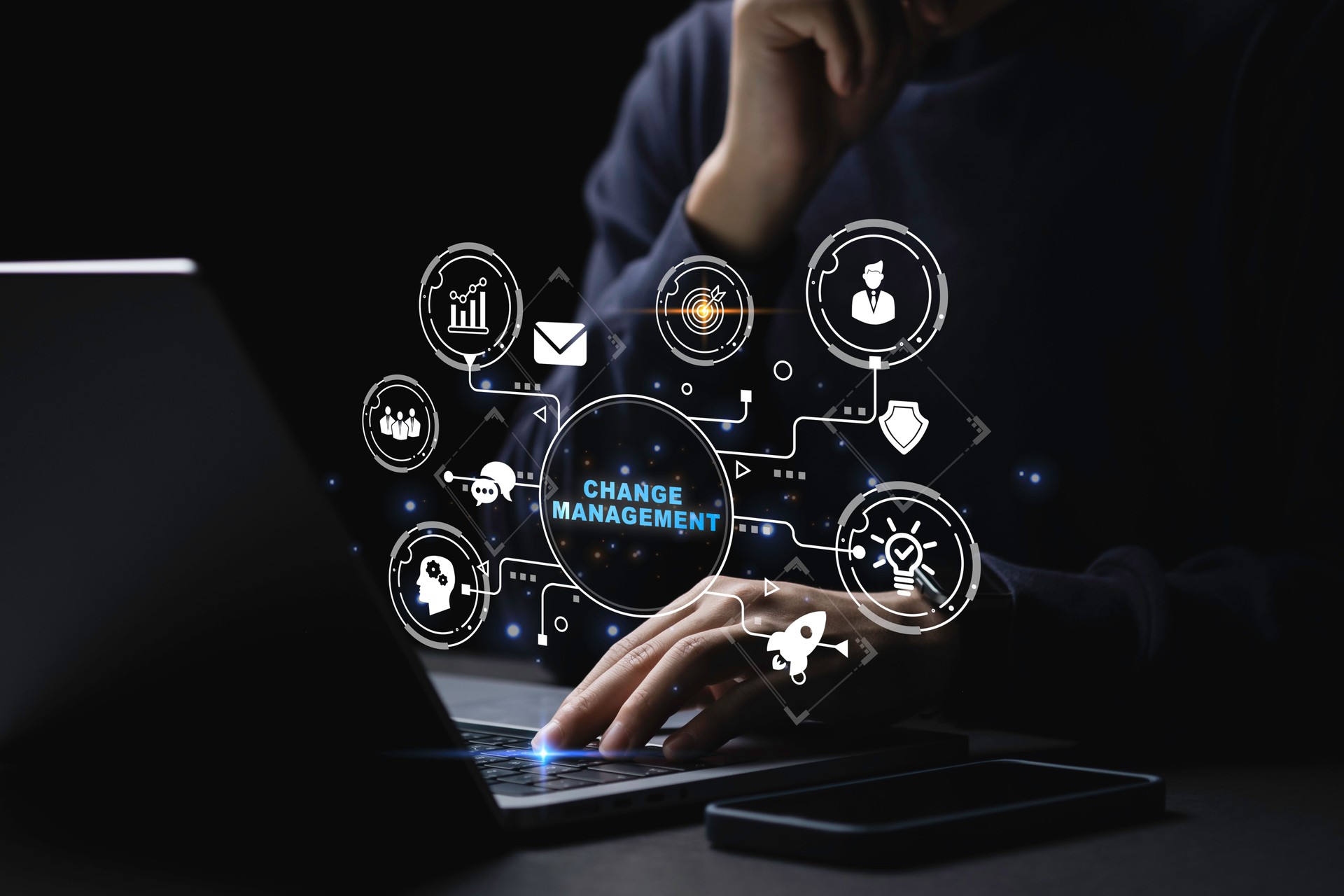 Businessman using a computer to document Change management in organization and business concept with consultant presenting icons of strategy. Organizational transition and transformation