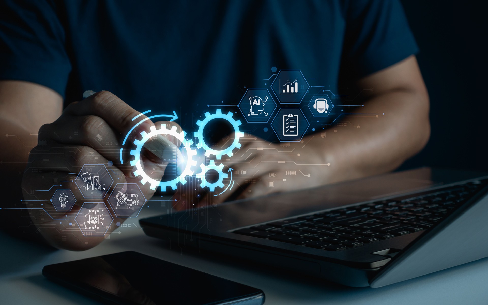 Robotic process automation concept, RPA, artificial intelligence. Man use laptop with virtual monitoring technology to automate business tasks with AI. Digital transformation and change management.