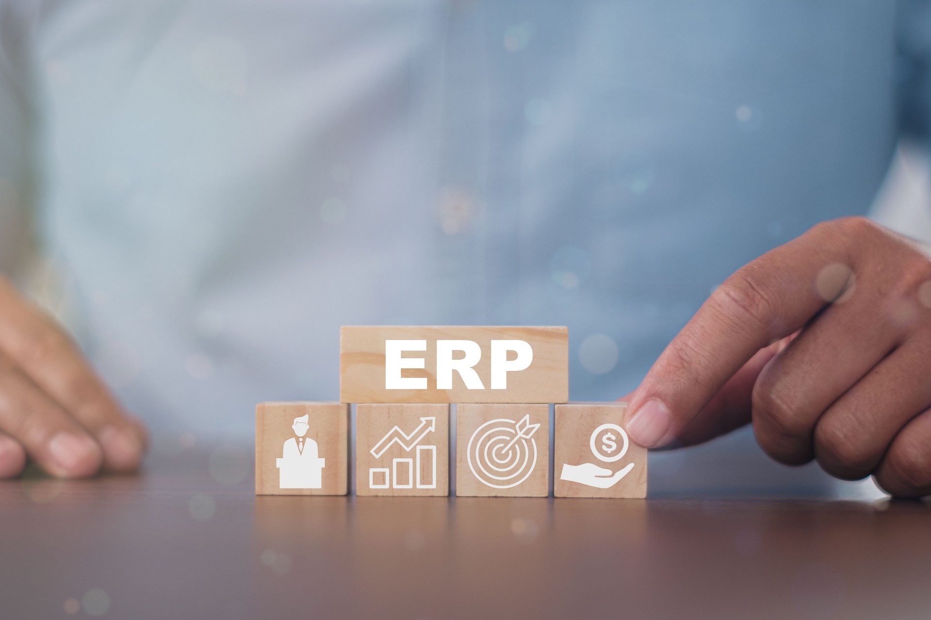Wooden blocks with symbol of ERP, Enterprise Resources Planning business and technology concept."n